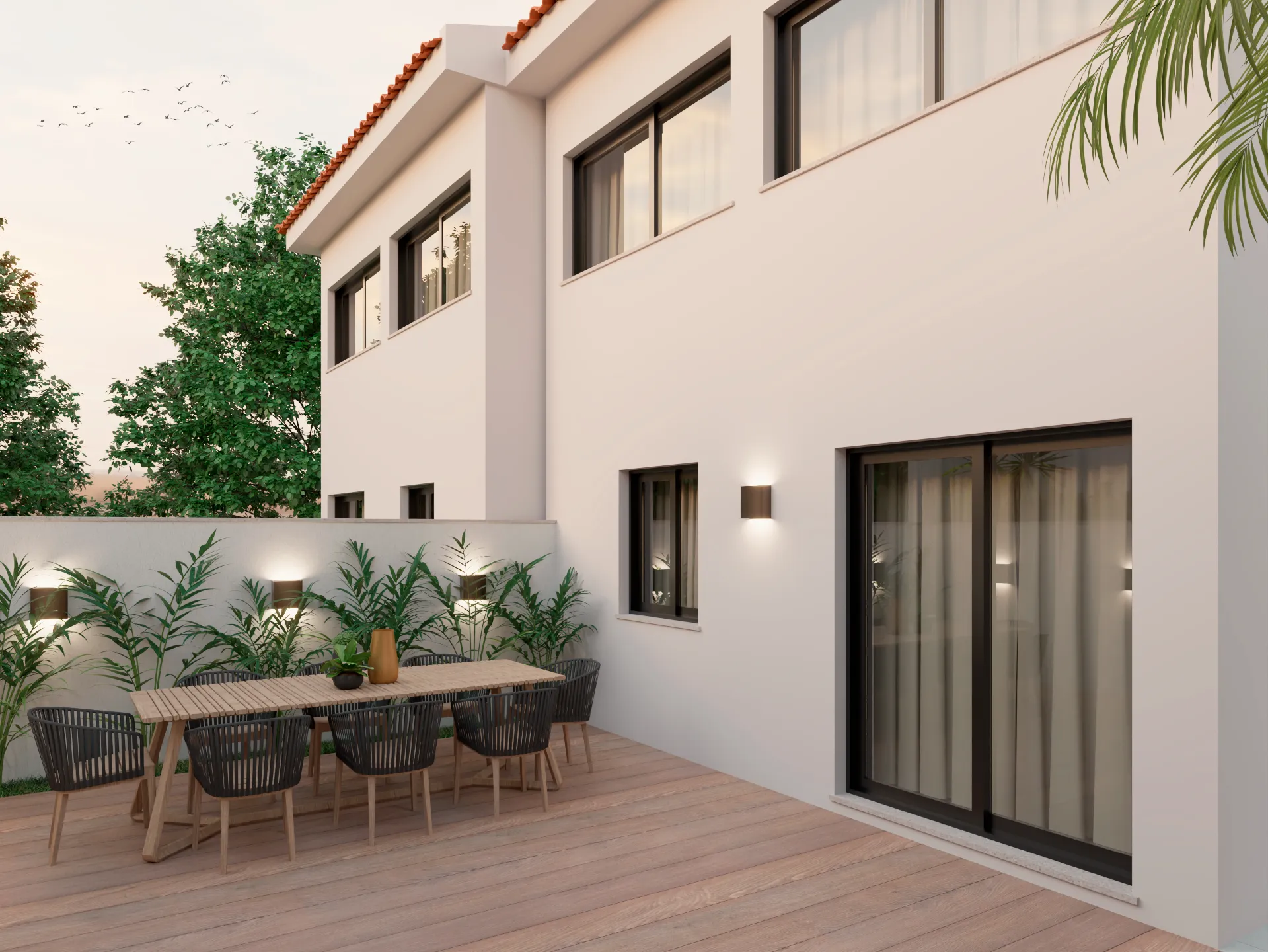 Terraço com zona de refeições junto à fachada